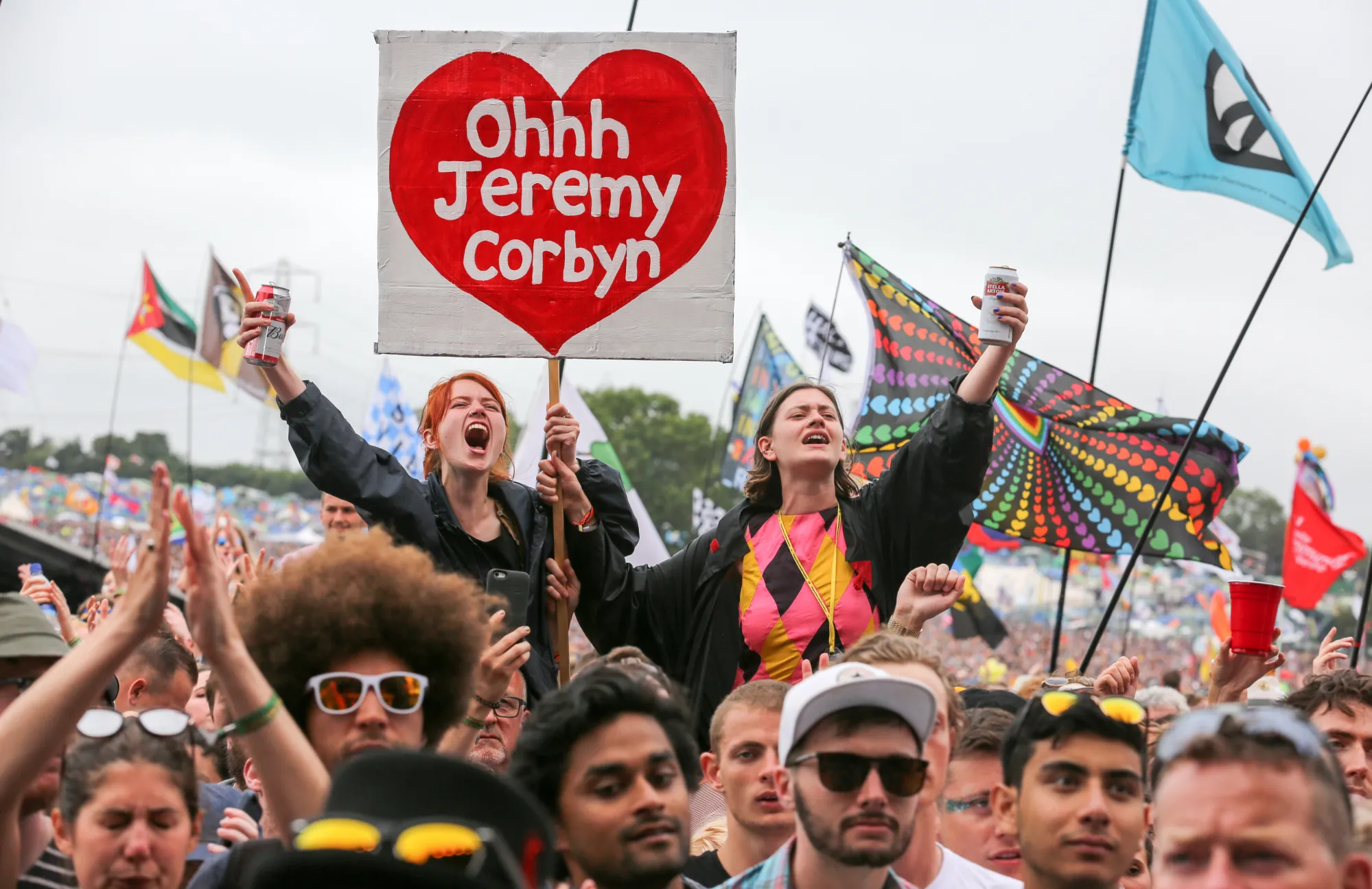 Crowds cheer Labour Party leader Jeremy Corbyn at the Glastonbury Festival in June 2017.
