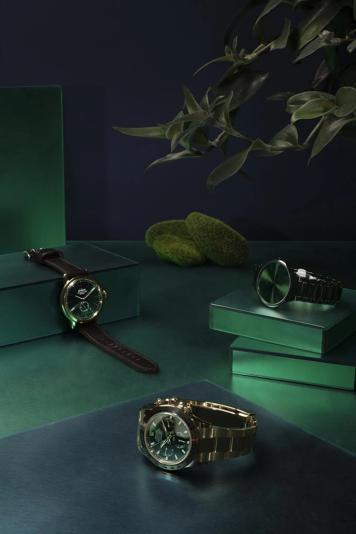 Clockwise from top-left: Shinola Bedrock, the brand’s first dress watch, $750;&nbsp;Rado True Thinline, with a unique green bracelet,&nbsp;$2,100; Rolex Cosmograph Daytona in the brand’s signature yellow gold, $34,650.