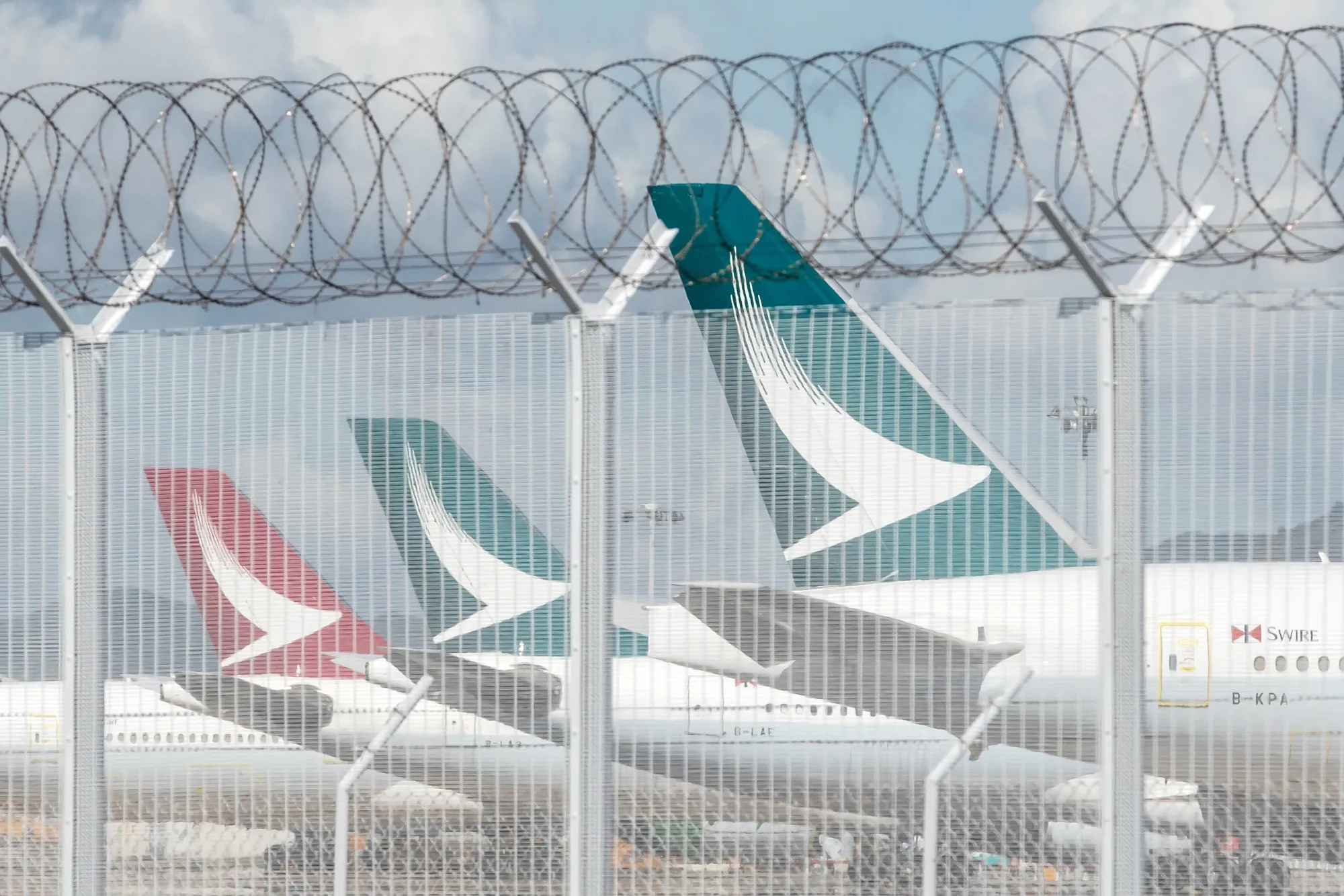 Cathay Pacific Aircraft at Hong Kong Airport Ahead of Earnings