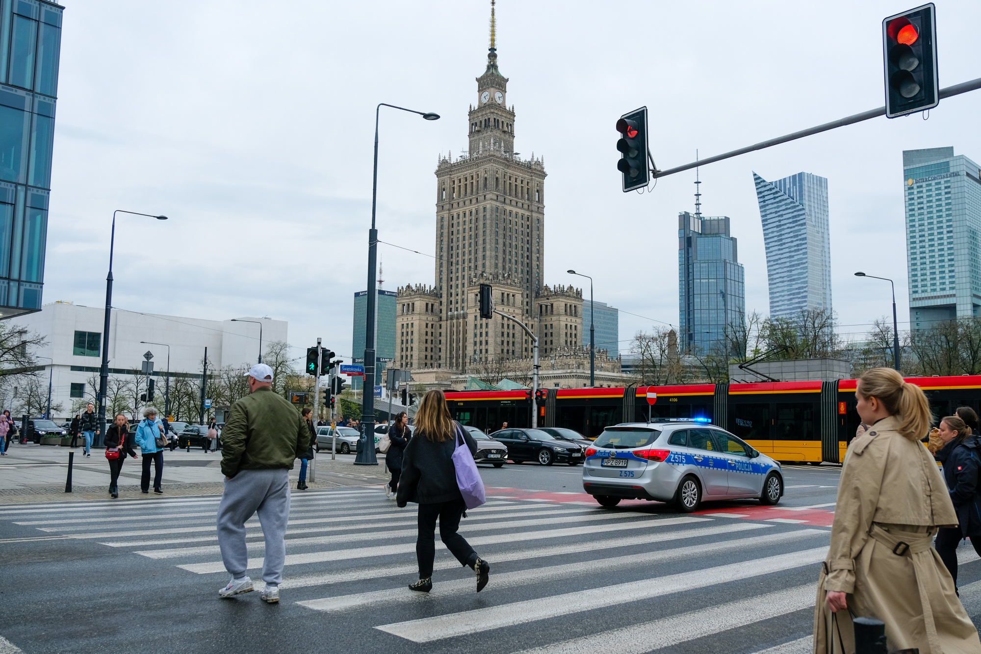 The intersection of Jerozolimskie Avenue and Jana Pawa II Avenue in the center of Warsaw, Poland, on Tuesday, April 2, 2024. Polish inflation fell to the central bank's target for the first time in three years in March even as policymakers are expected to keep interest rates steady due to concerns over resurgent price growth later in 2024. Photographer: Damian Lemanski/Bloomberg
