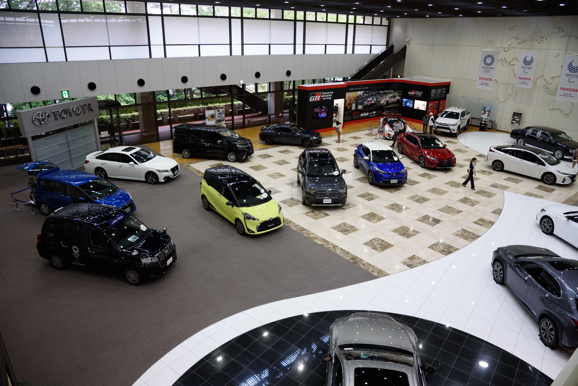 Toyota vehicles at a showroom in Toyota City.
