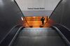 A transit officer is seen at a closed Federal Triangle Station in Washington, DC. The region’s public transit agency released a plan to close 19 stations, among other cuts, unless federal aid provides some financial relief.
