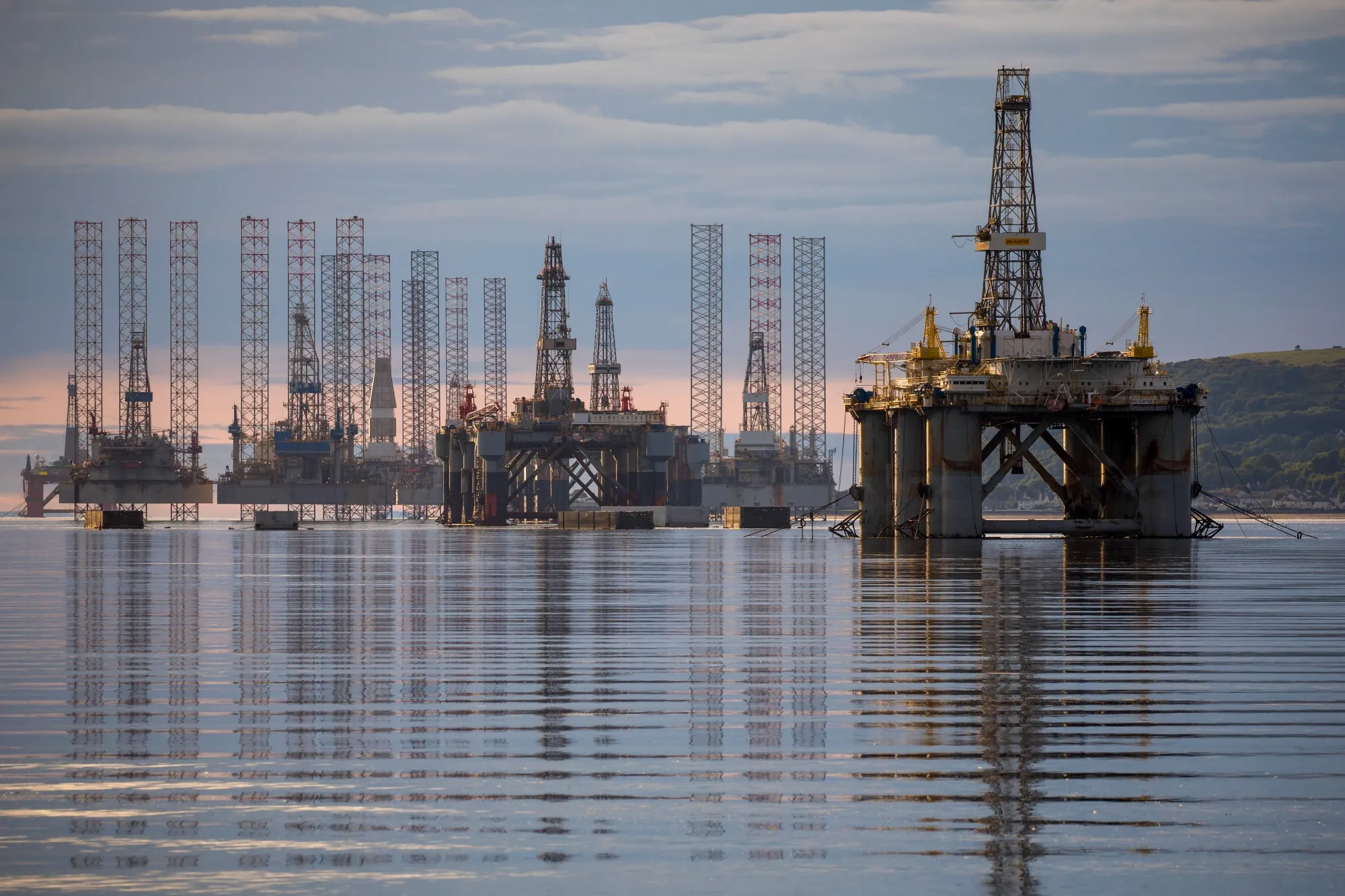 Mobile offshore drilling units stand in the Port of Cromarty Firth in Cromarty, U.K.