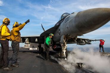 An F/A-18E Super Hornet fighter jet prepares to launch from the USS Abraham Lincoln in April.