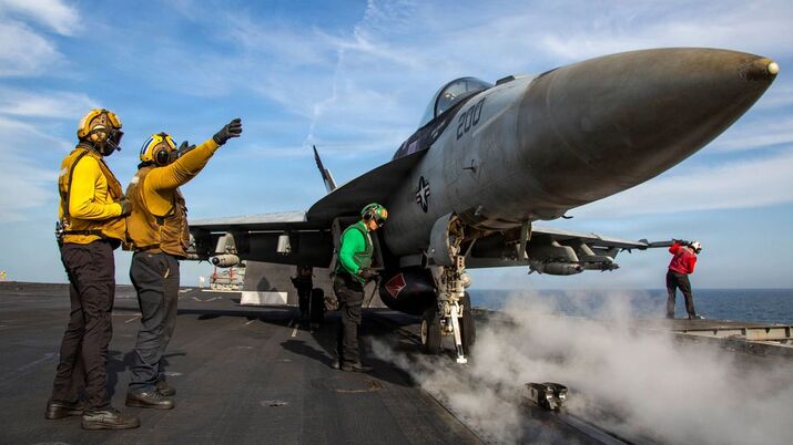 An F/A-18E Super Hornet fighter jet prepares to launch from the USS Abraham Lincoln in April.
