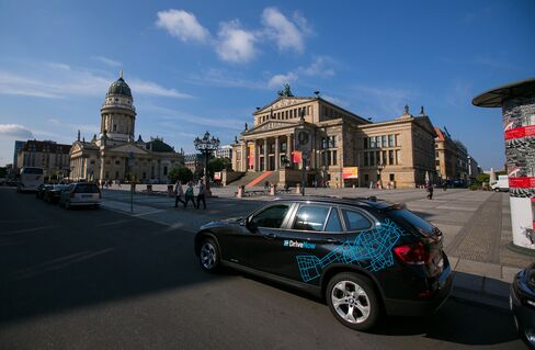 A DriveNow car parked outside the Konzerthaus in Berlin. Photographer: Krisztian Bocsi/Bloomberg