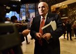 Rudy Giuliani speaks to members of the media while arriving at Trump Tower in New York, on Nov. 22, 2016.