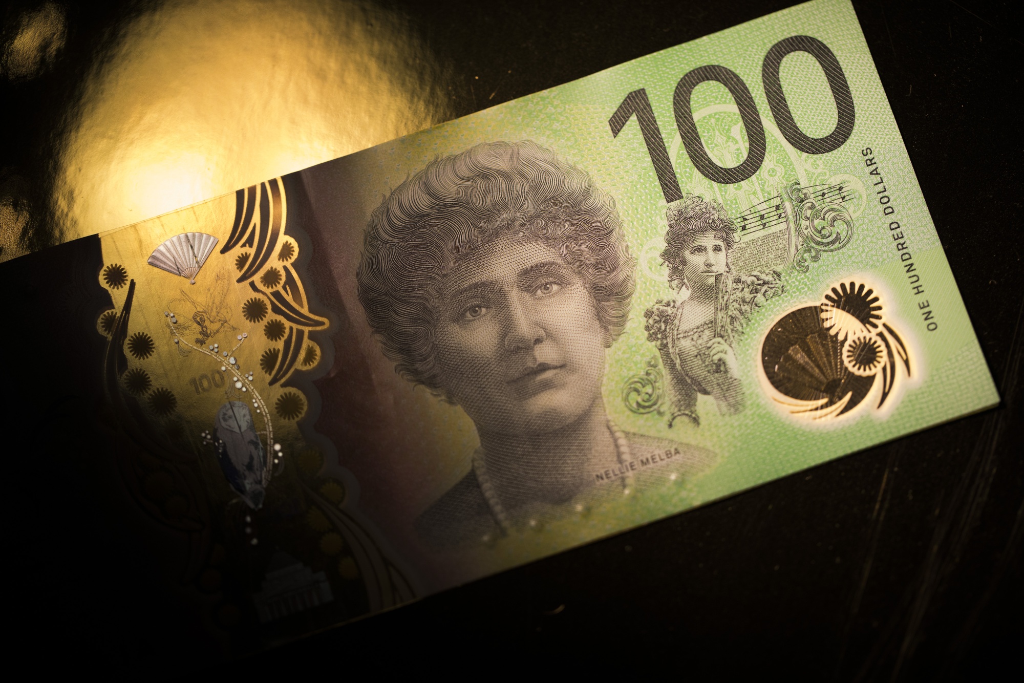 An Australian one-hundred dollar banknote. Photographer: Brent Lewin/Bloomberg