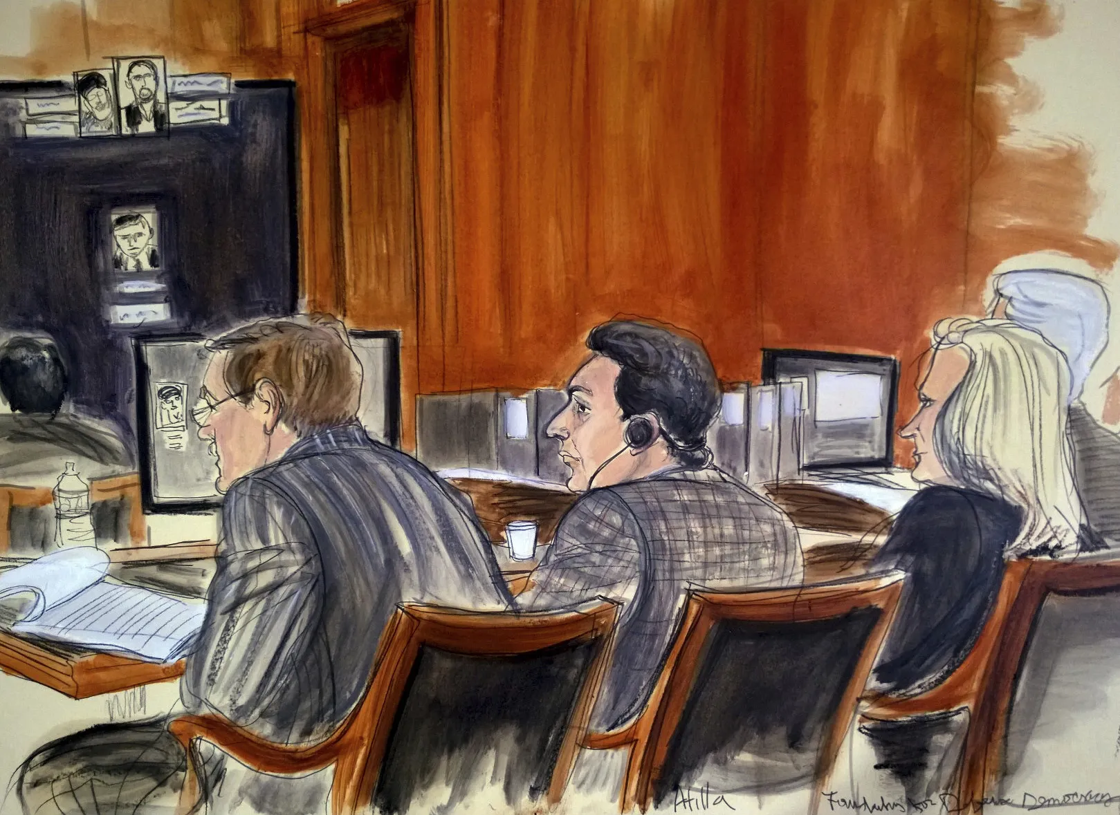 Mehmet Hakan Atilla, center, listens to proceedings in this court room sketch, on Nov. 28, 2017.