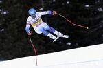 United States' Ryan Cochran Siegle speeds down the course during an alpine ski, men's World Cup downhill training, in Val Gardena, Italy, Thursday, Dec. 16, 2021. (AP Photo/Alessandro Trovati)