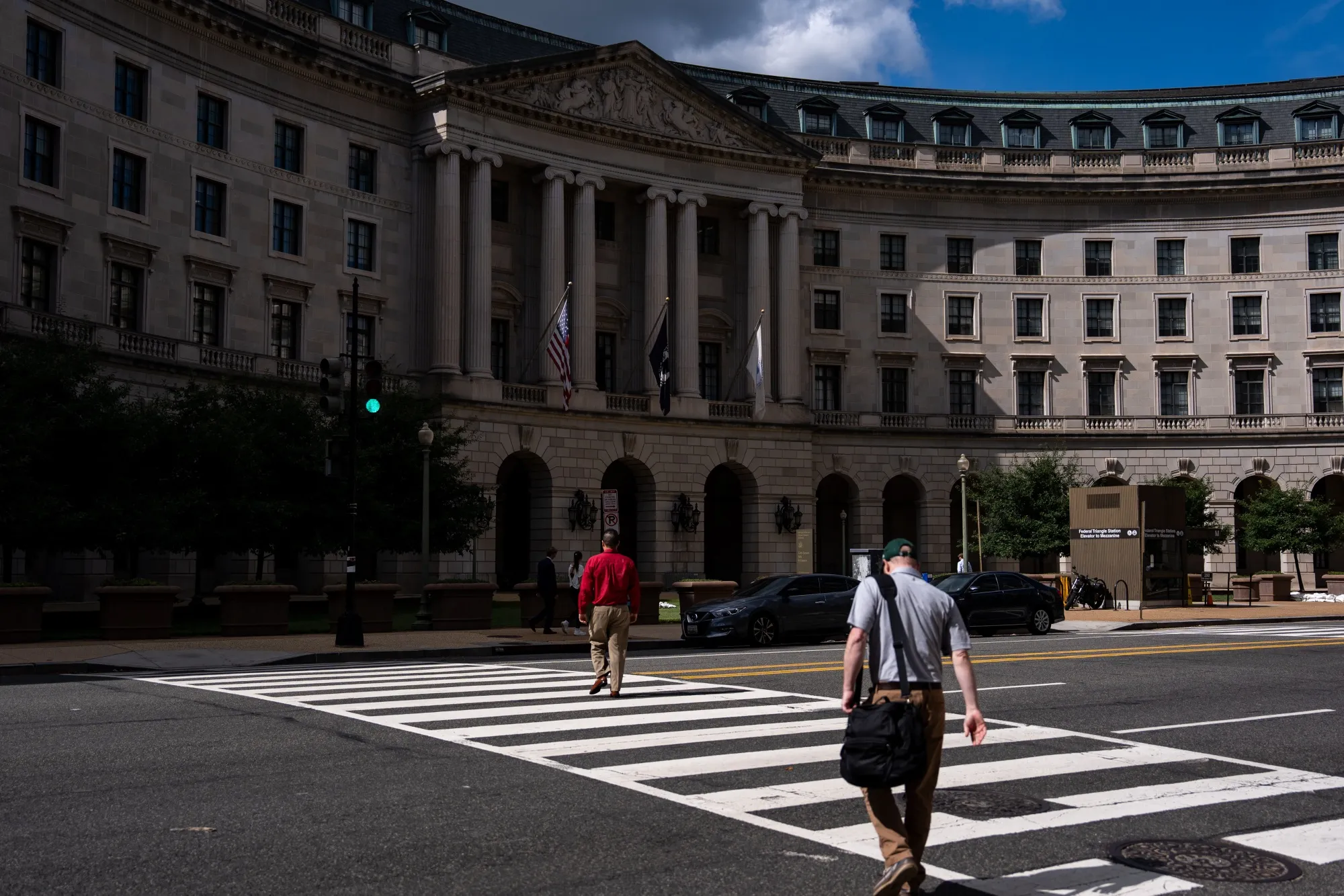 Commuters near the EPA&nbsp;headquarters in Washington on Oct. 2.