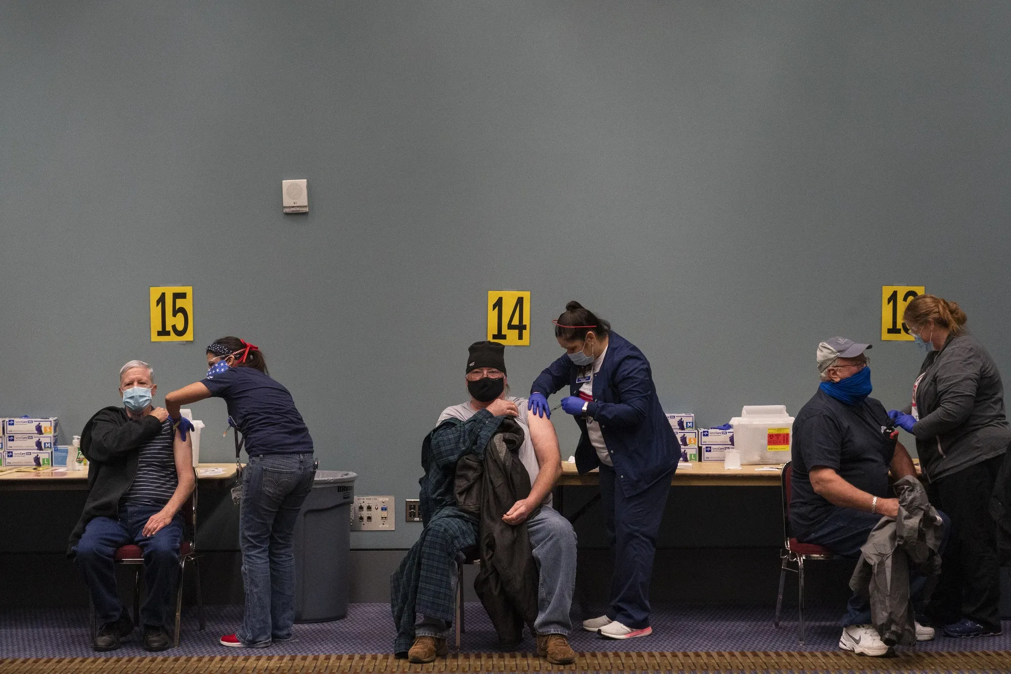 At the core, the vaccination effort is&nbsp;one big assembly line —&nbsp;except for people rather than machines.