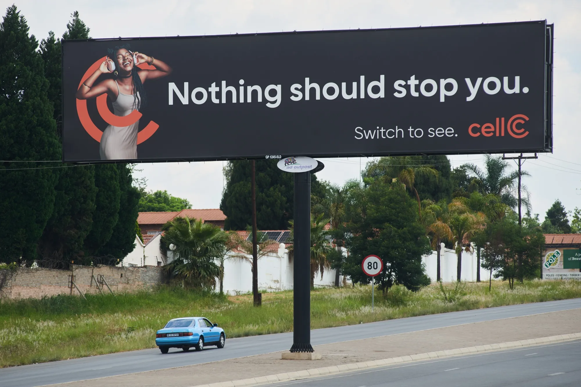 A Cell C Ltd. advertisement billboard in Johannesburg.