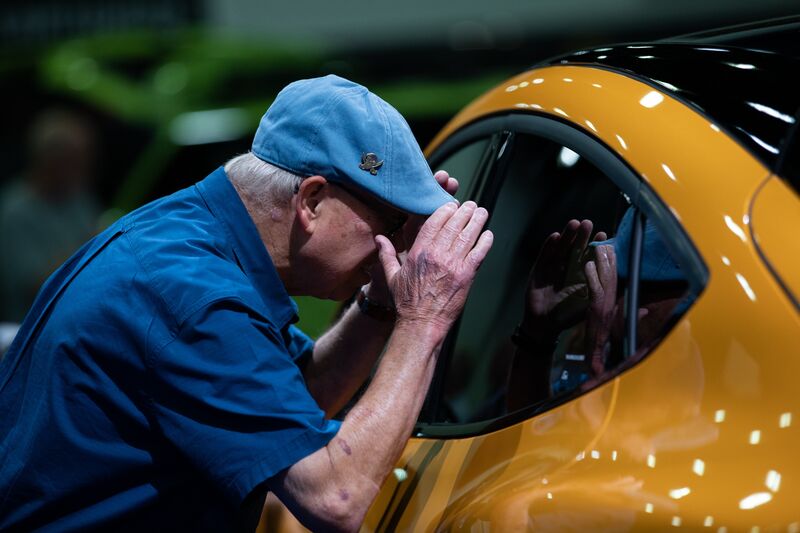 An attendee views a Ford Mustang Mach-E GT vehicle during the 2022 North American International Auto Show in Detroit, Michigan in September.