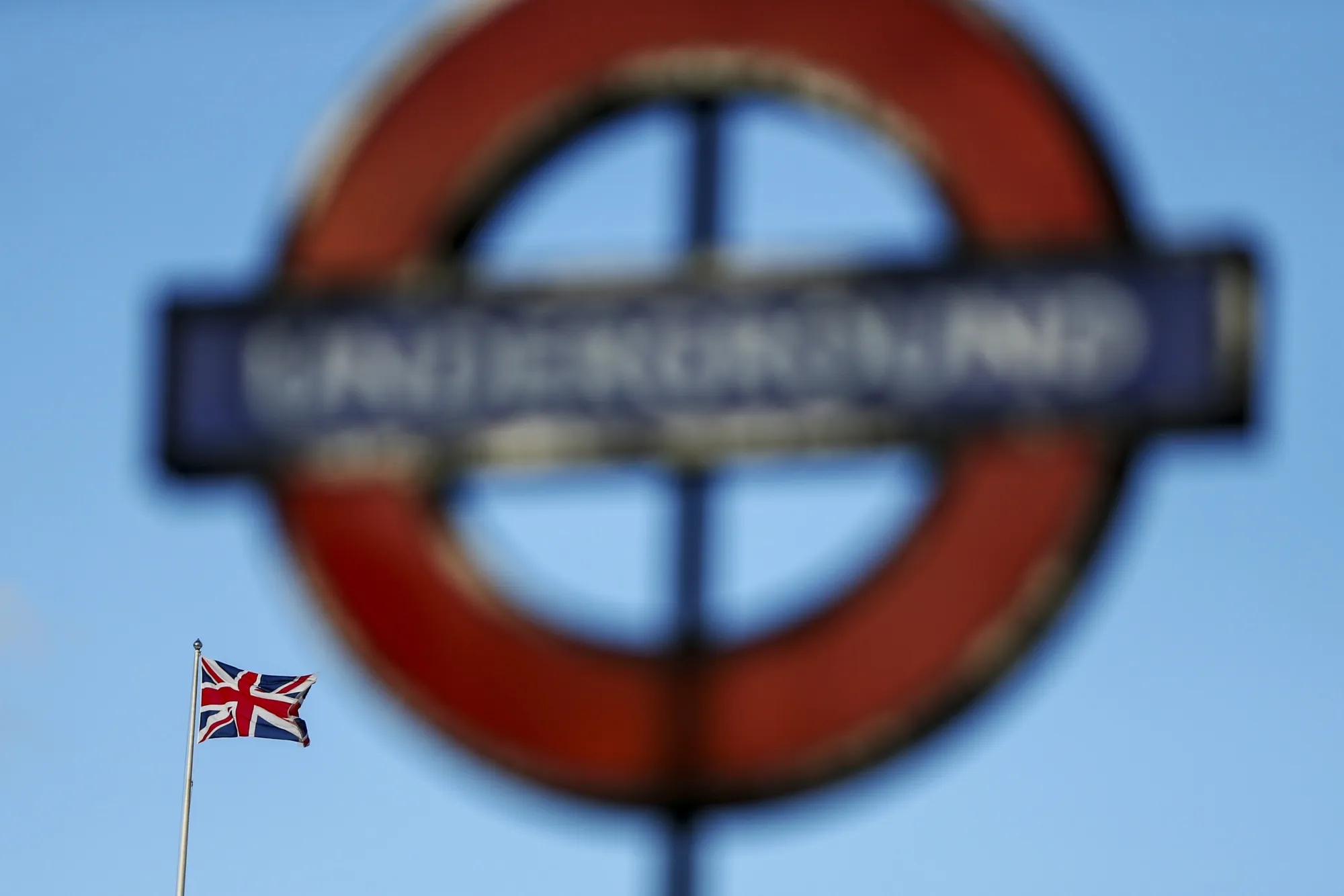 A British Union flag near an entrance Westminster London Underground station.