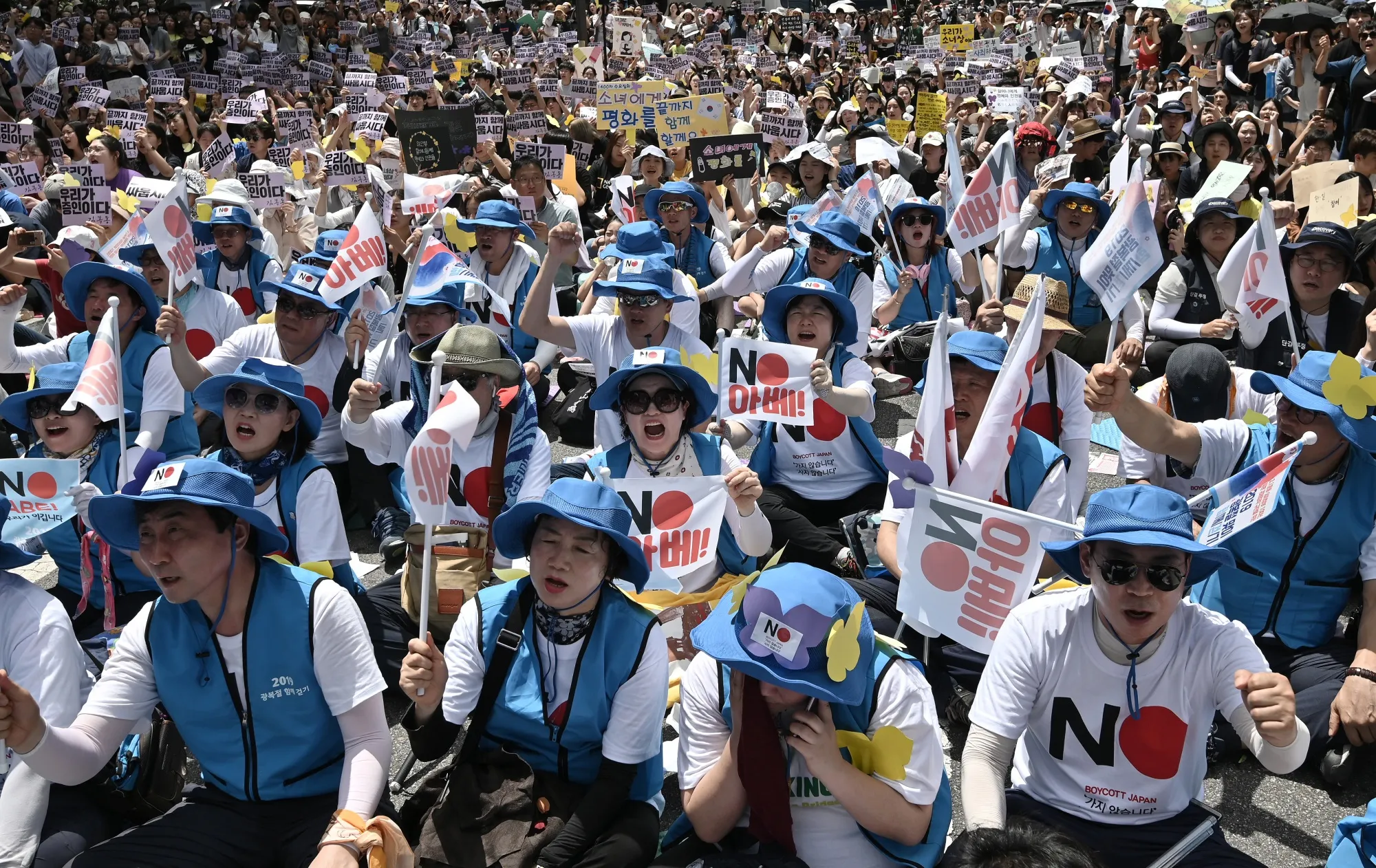 South Koreans participate in a rally against Japan’s trade restrictions on South Korea, in Seoul on Aug. 14.