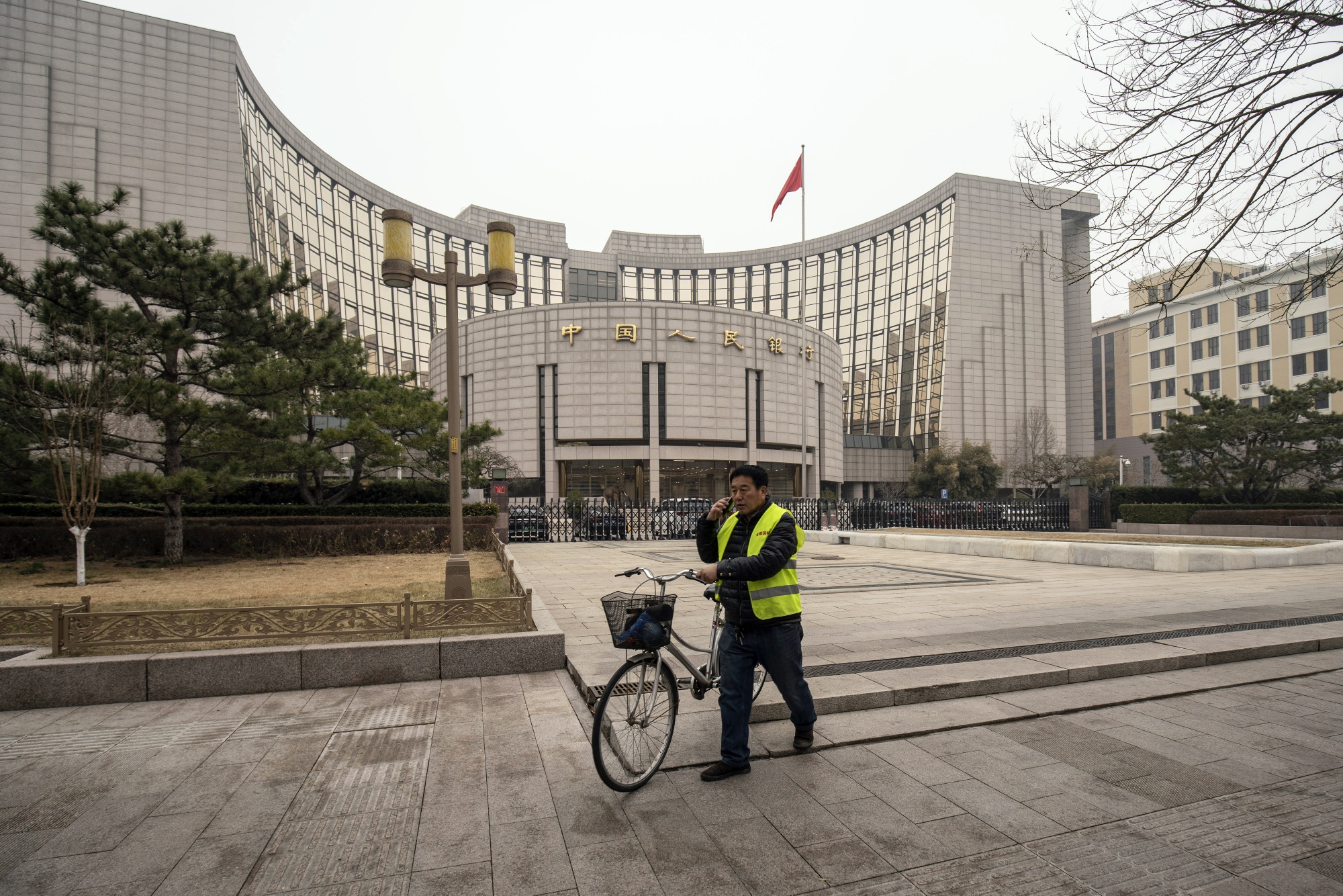 China’s Central Bank Signals Easing As Economic Risks Mount - Bloomberg