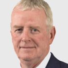 Headshot of John J Moloney