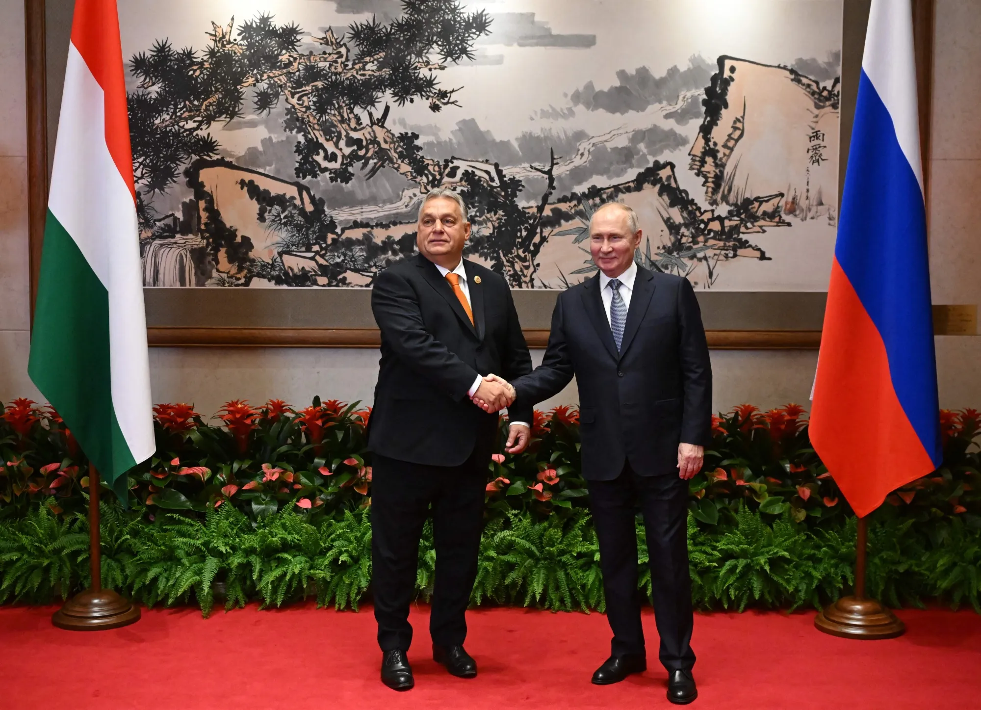 Vladimir Putin, right, meets Viktor Orban in Beijing on Oct. 17.