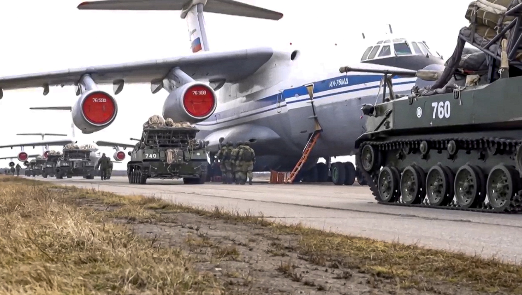 Russian military vehicles are loaded onto aircraft during drills in Crimea, in April.