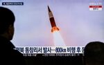 File footage of North Korea’s missile launch on a TV screen in Seoul on March 19.