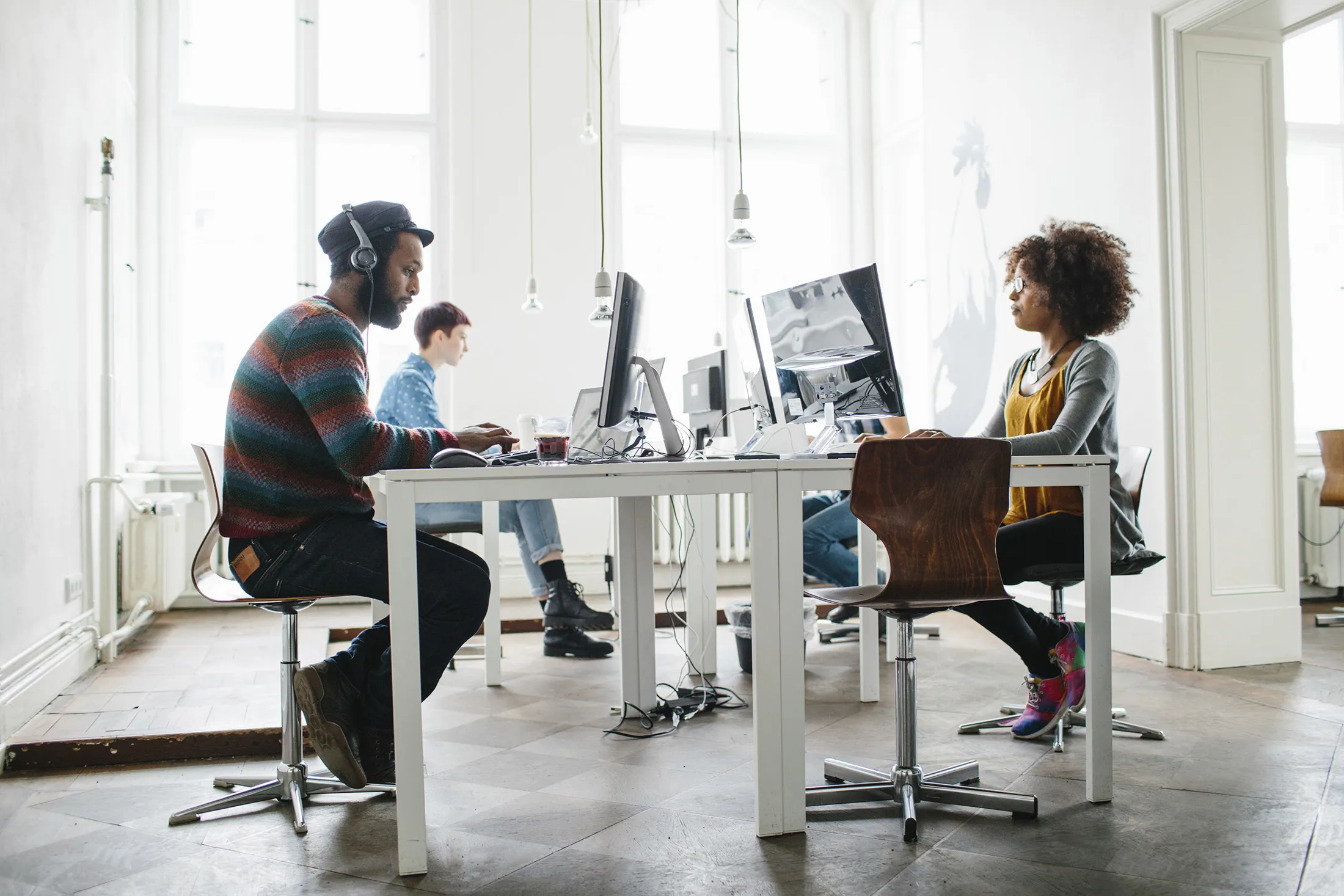 Employees work at a start up office.

