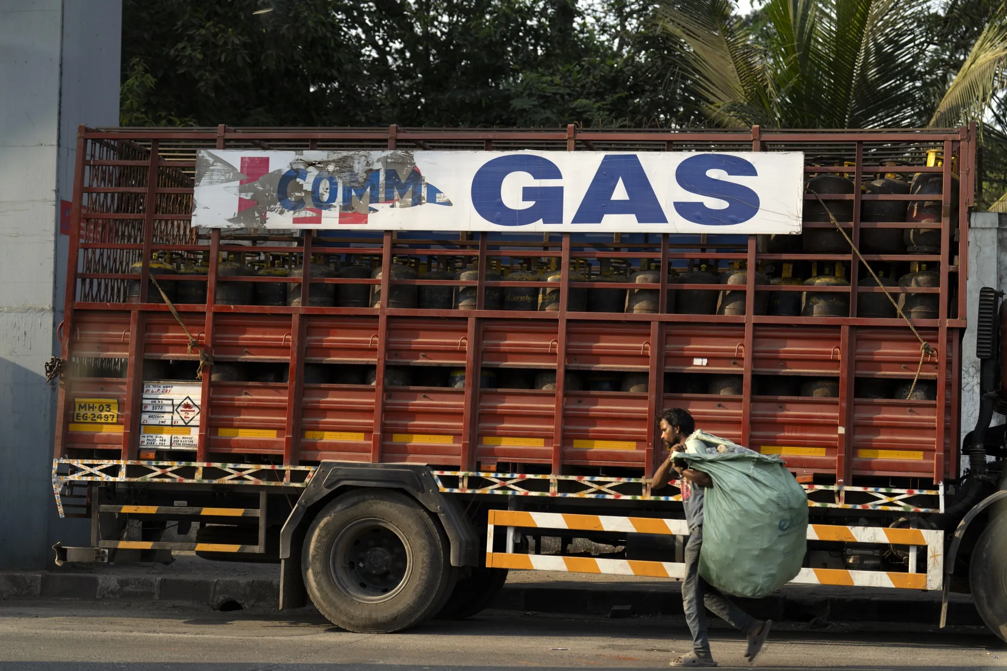 A truck loaded with gas cylinders parked outside a Bharat Petroleum oil refinery in Mumbai.