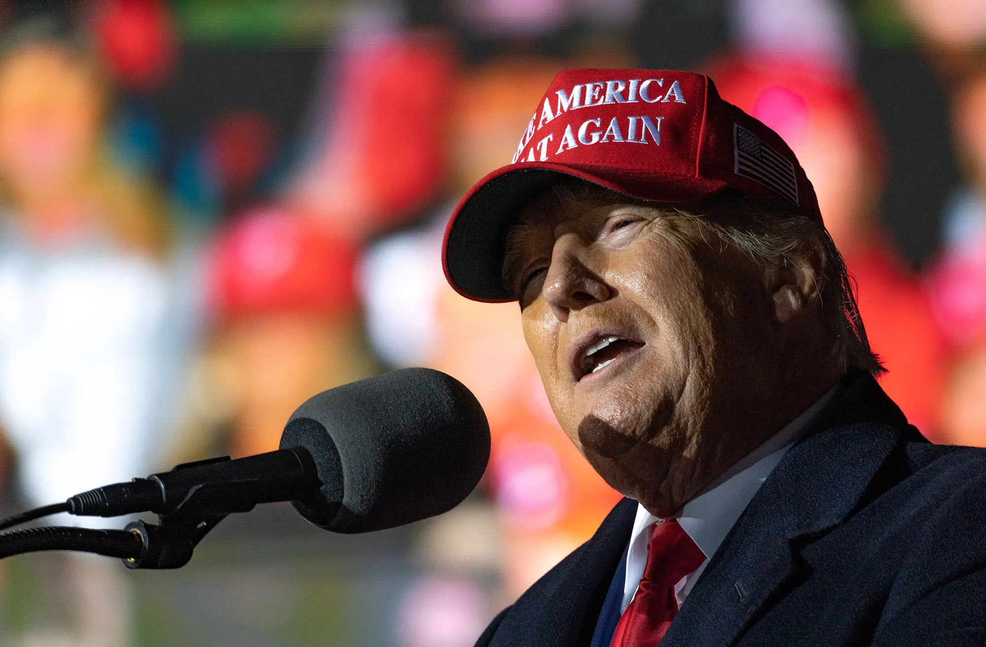 Former U.S. President Donald Trump speaks during a rally in Commerce, Georgia on March 26.