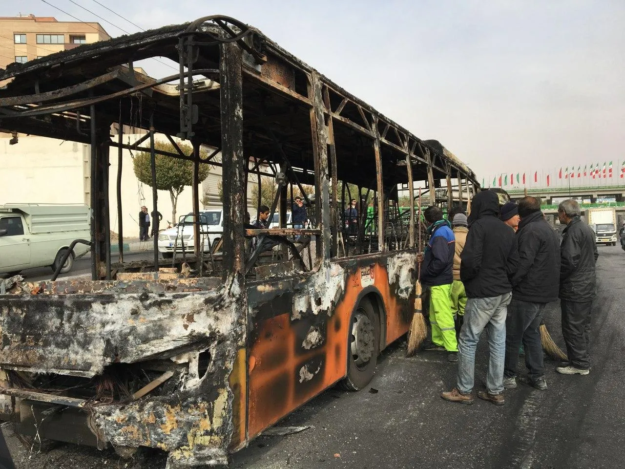People inspect a burned out bus following a&nbsp;demonstration against rises in gasoline prices, in&nbsp;Isfahan,&nbsp;Iran, on Nov.&nbsp;17.