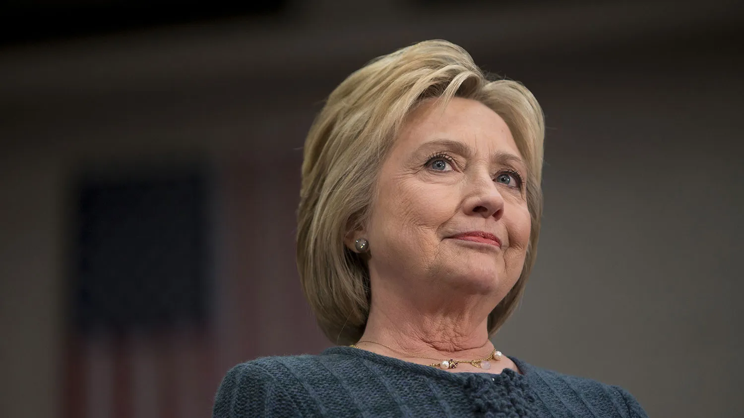Hillary Clinton listens during her introduction at a campaign event in Concord, New Hampshire, on Feb. 6, 2016.

