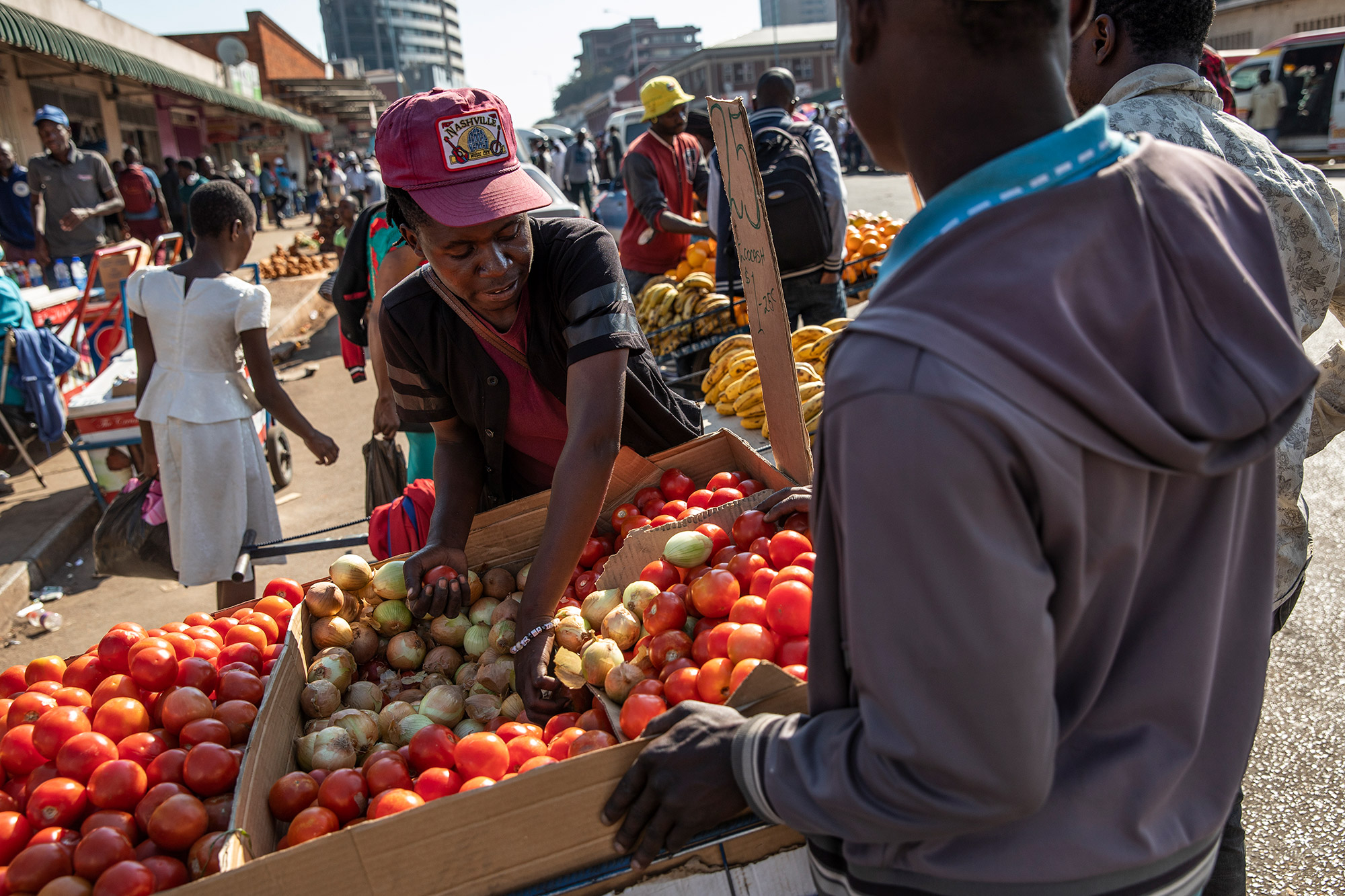 Street vendors sell goods in a market&nbsp;in Harare, Zimbabwe.