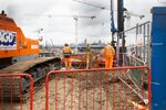 Construction employees look out over the Old Oak Common project of the High Speed Two HS2 Ltd. railway development in London, UK, on Tuesday, March 7, 2023. Costs for HS2 Europe's biggest infrastructure project are estimated to have spiraled beyond 100 billion ($124 billion). Photographer: Chris Ratcliffe/Bloomberg