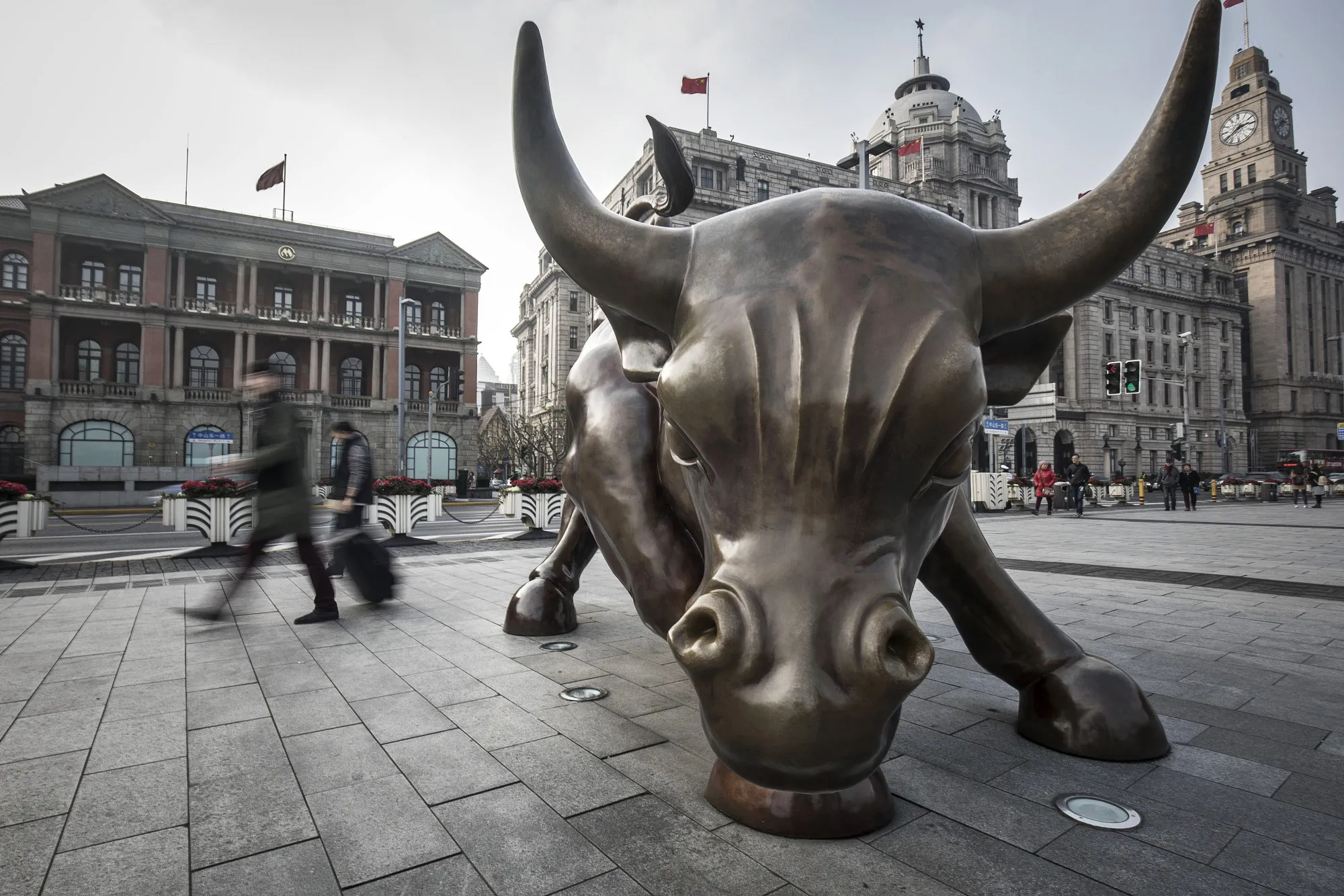The Bund Bull stands in Shanghai, China.