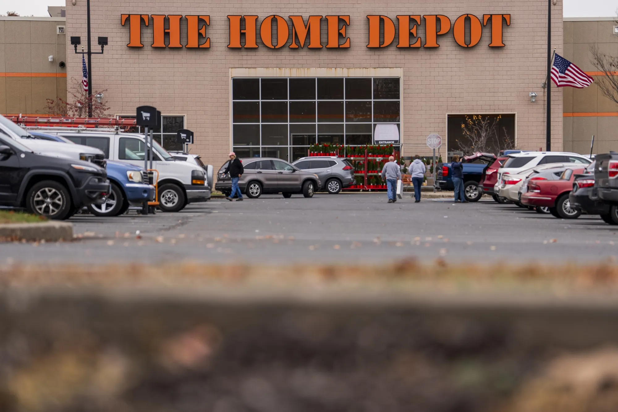 Customers outside a Home Depot store.