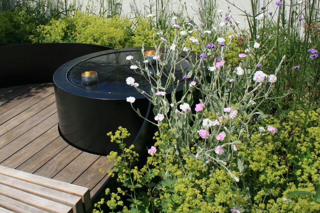 A water fountain on a rooftop garden of a home in Frankfurt. 