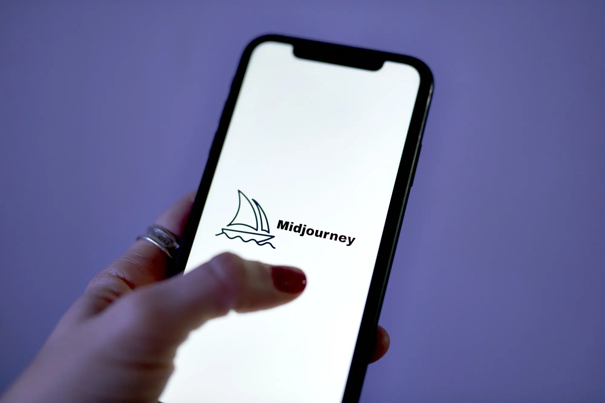 The Midjourney logo on a smartphone arranged in New York, US, on Thursday, Aug. 17, 2023.&nbsp;