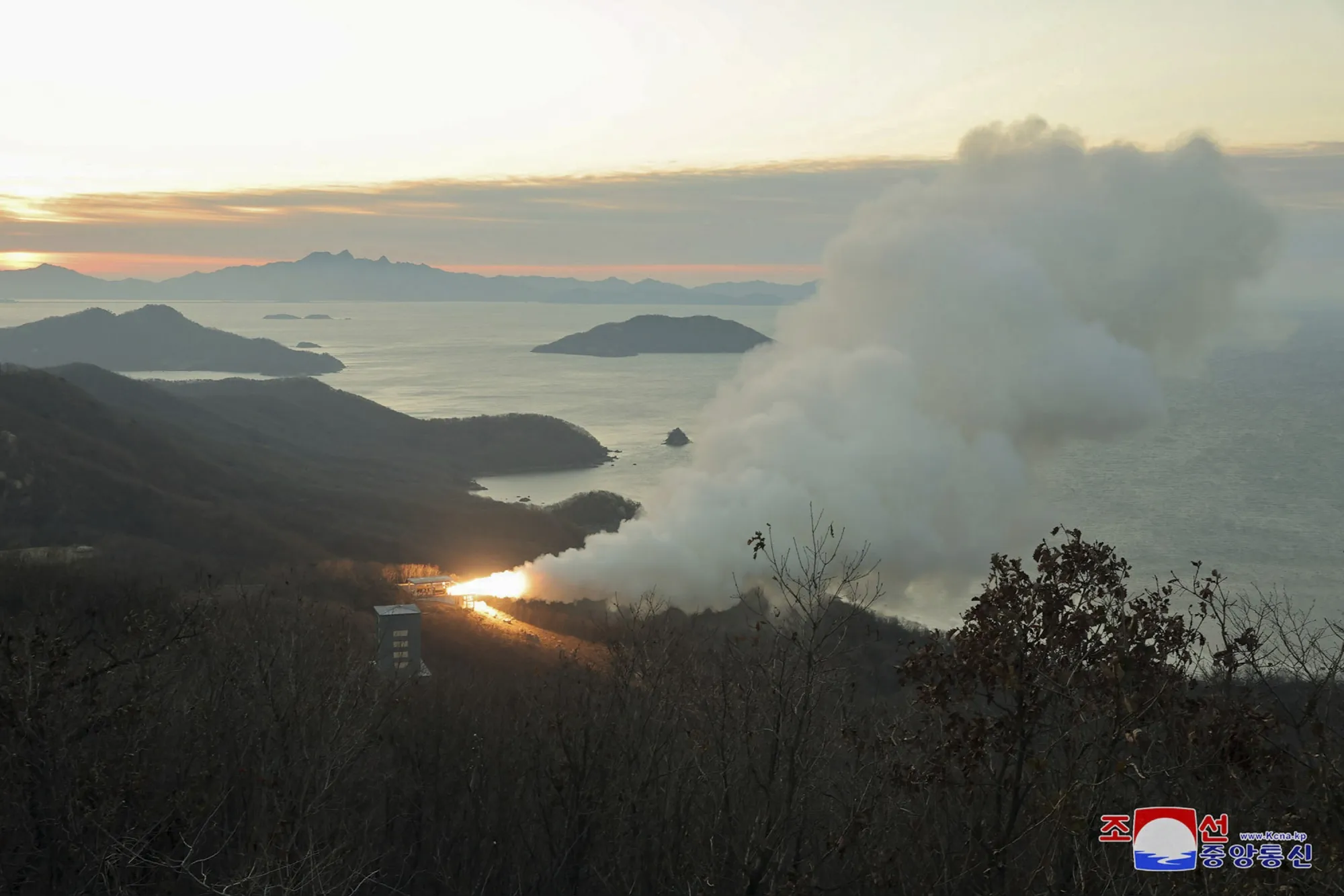 An undated photo shows the testing of new solid-fuel engines in North Korea.