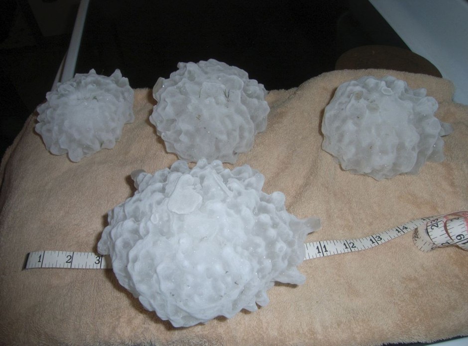 The biggest hailstone known in the U.S., front and center.