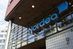 A logo sits above the entrance to a Nordea Bank AB bank branch in Helsinki.
