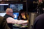 Traders work on the floor of the New York Stock Exchange (NYSE) in New York, U.S..
