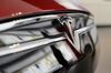 The Tesla Motors Inc. logo is seen on the grill of a Model S P85D electric vehicle (EV) at the company's retail store in San Jose, California, U.S., on Thursday, Aug. 20, 2015.