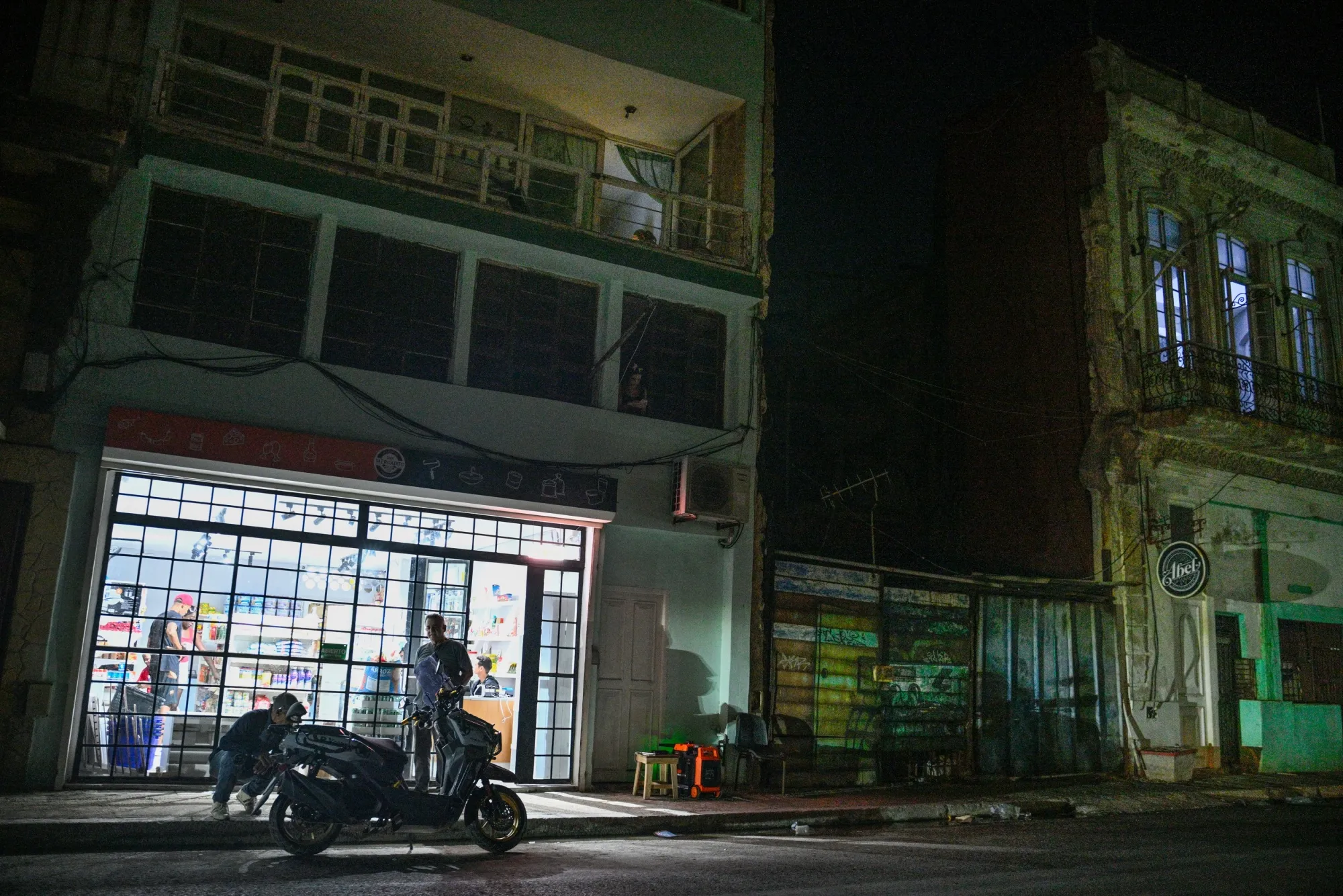 A store lit by an electric generator during a blackout in Havana on March 4.