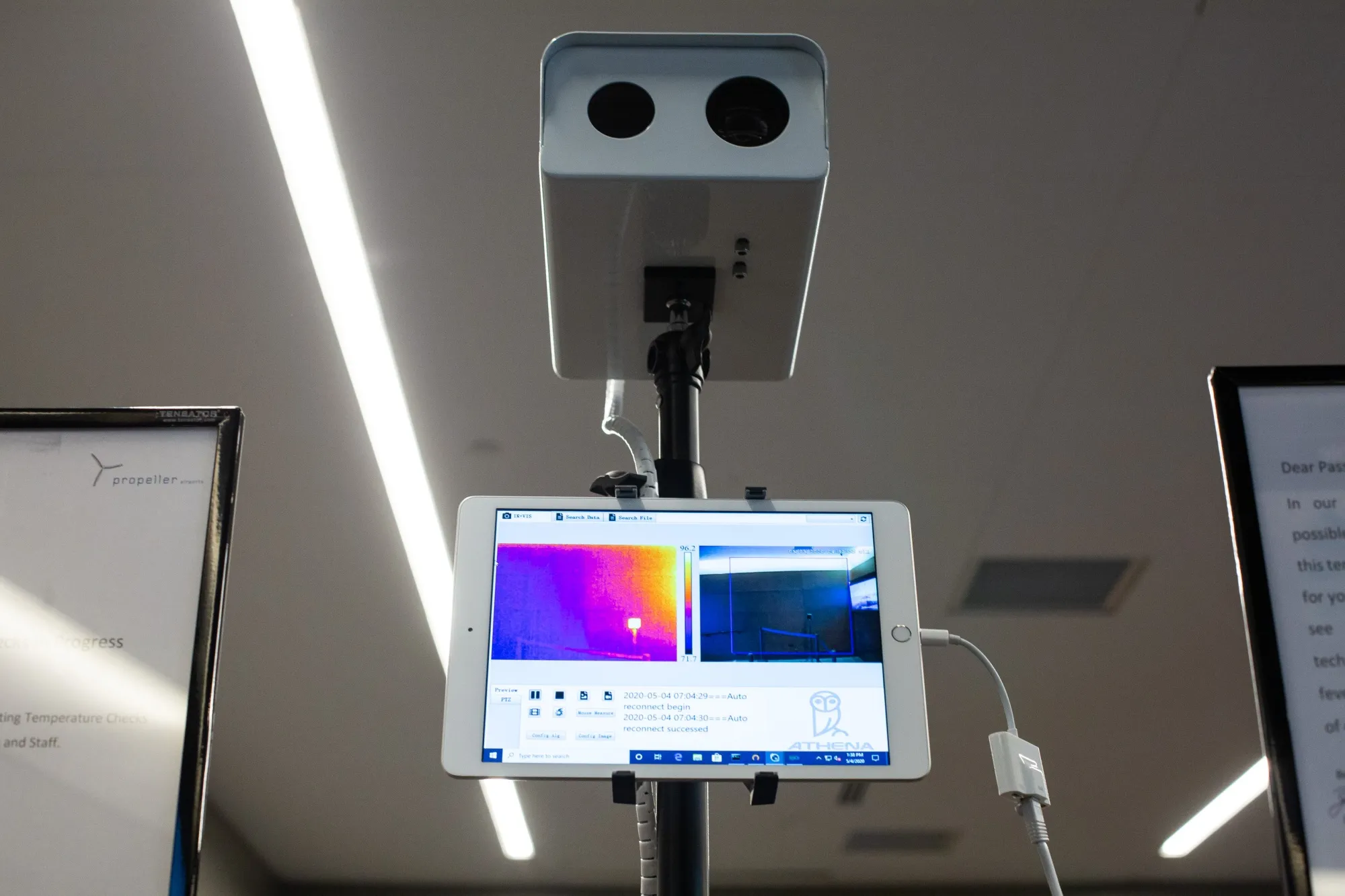 A body temperature detection system stands at a passenger security check point at the Propeller Airports Paine Field airport in Everett, Washington.
