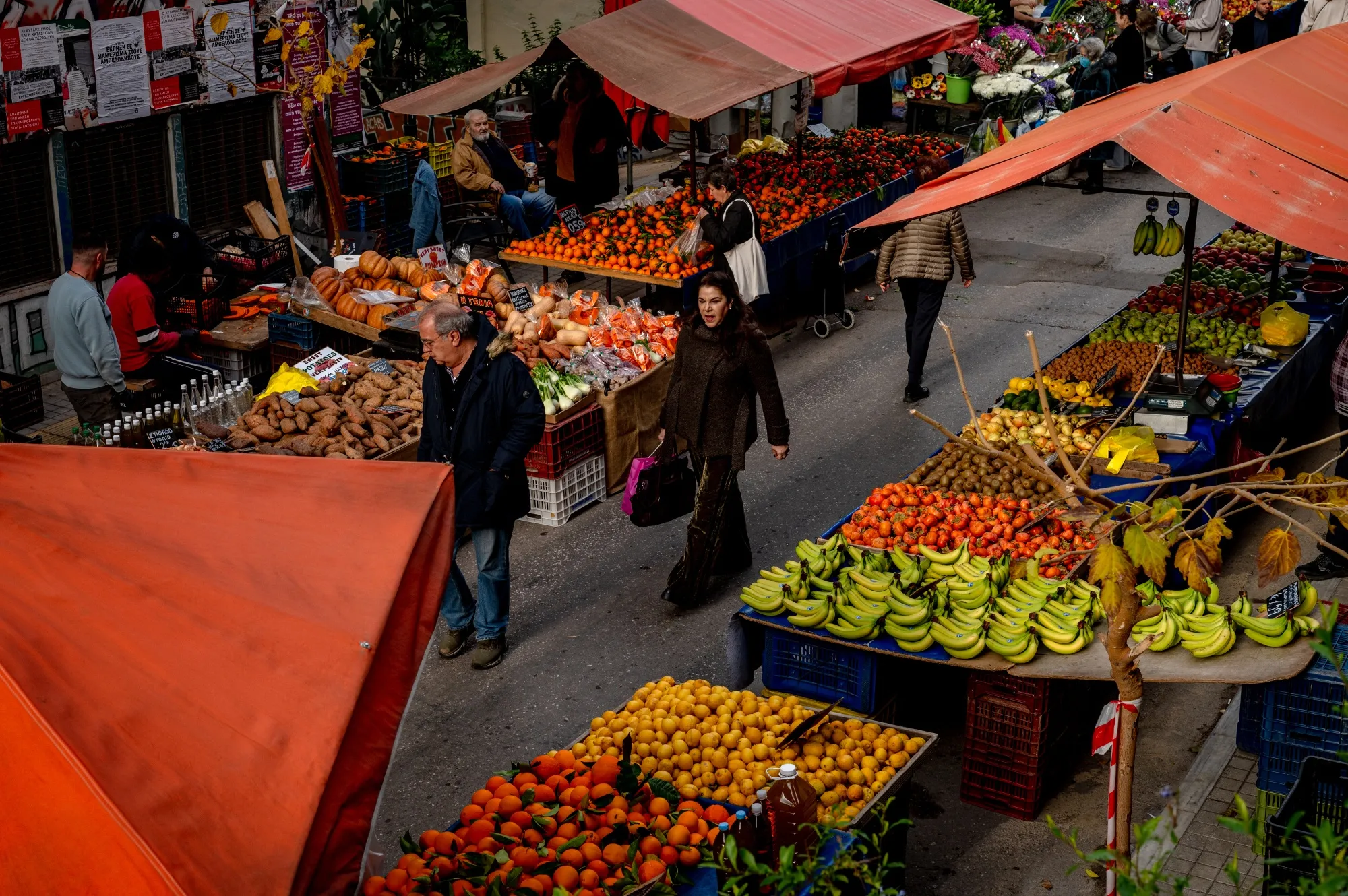 Shoppers at a farmers market in Athens.