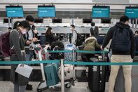 Reaction In Hong Kong As WHO Considers Emergency Decree