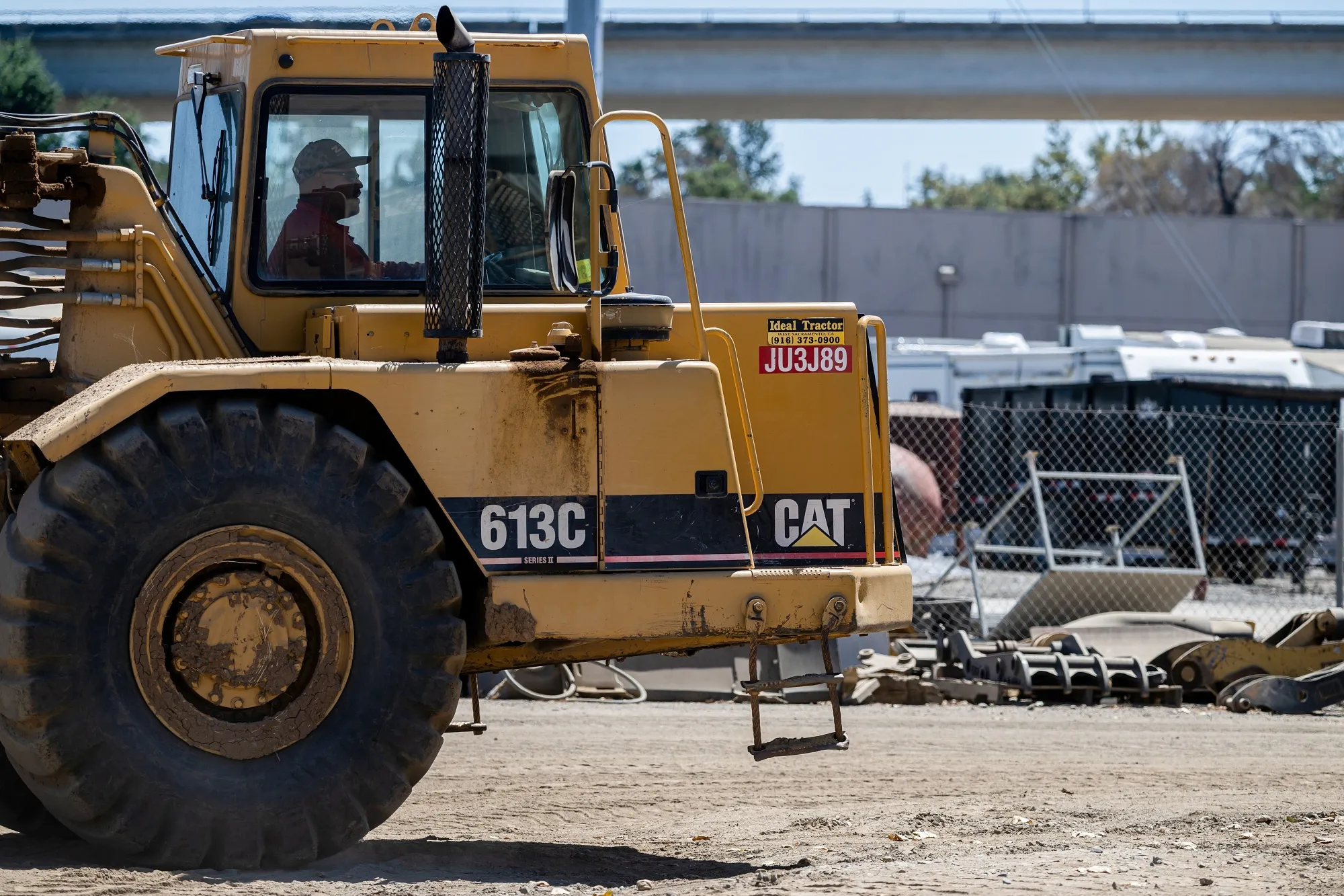 A Caterpillar 613C scraper at Ideal Tractor in West Sacramento, California, US, on Thursday, Aug. 7, 2025. Caterpillar Inc. has given investors annual guidance for the first time on how much tariffs will impact the maker of iconic yellow diggers and bulldozers this year, as the Trump administration's trade war deepens.
