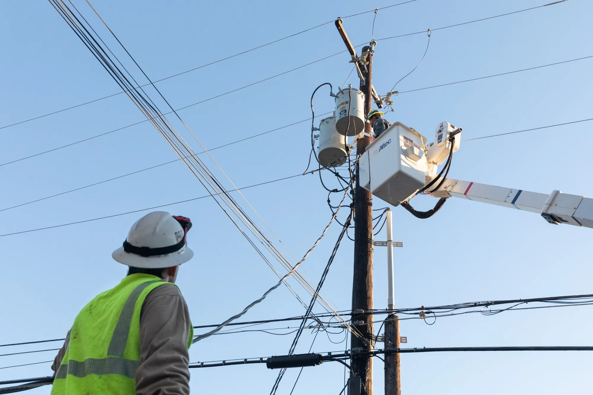 A worker repairs a power line in Austin, Texas.