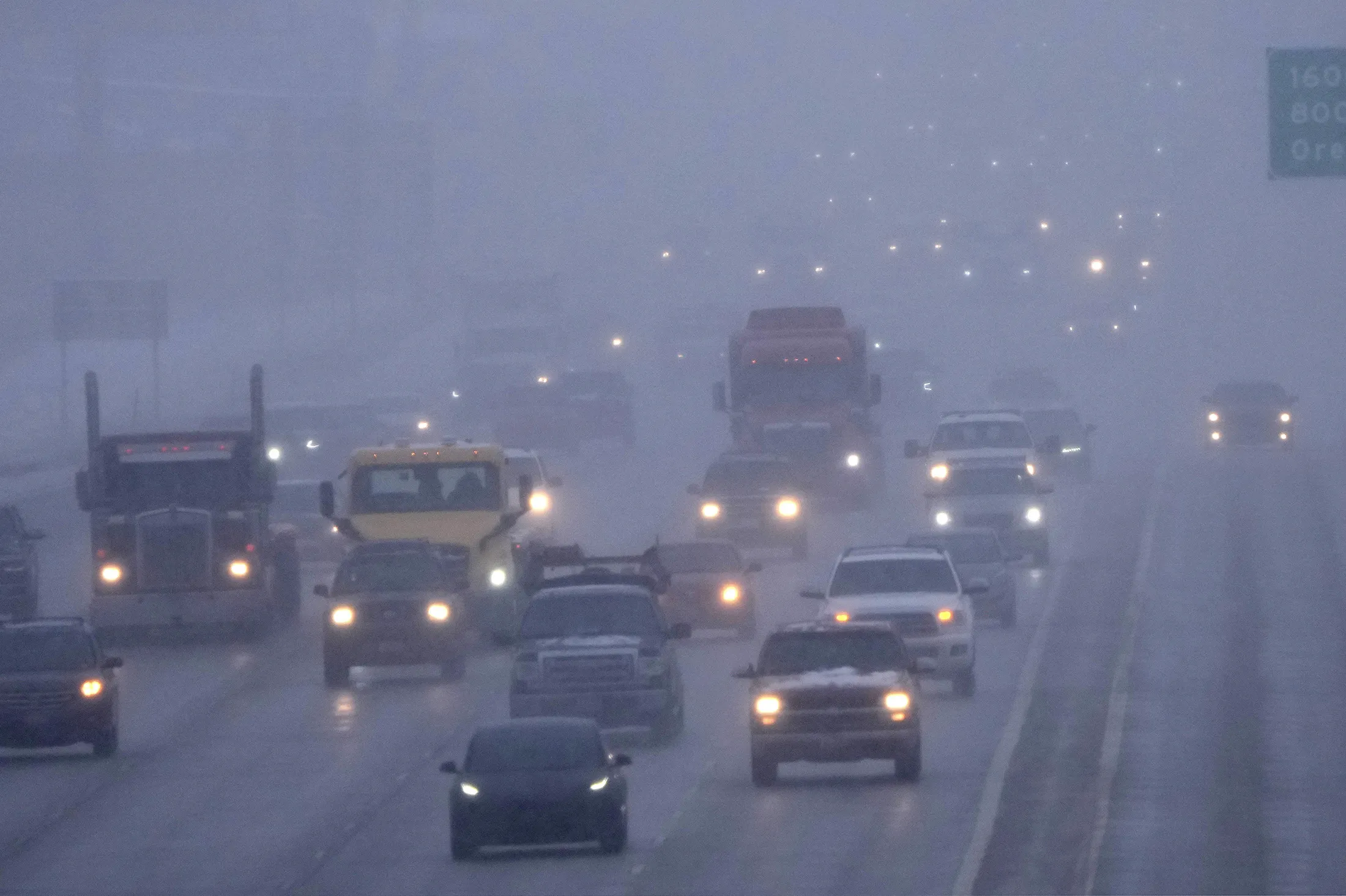 Vehicle on I-15 after an overnight storm in Lehi, Utah on Dec.&nbsp;13.