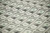 A 2017 50 subject uncut sheet of $1 dollar notes bearing the name of U.S. Treasury Secretary Steven Mnuchin sits on display at the U.S. Bureau of Engraving and Printing in Washington, D.C., U.S., on Wednesday, Nov. 15, 2017. A change in the Senate tax-overhaul plan that would expand a temporary income-tax break for partnerships, limited liability companies and other so-called \"pass-through\" businesses won the endorsement of a national small-business group today.