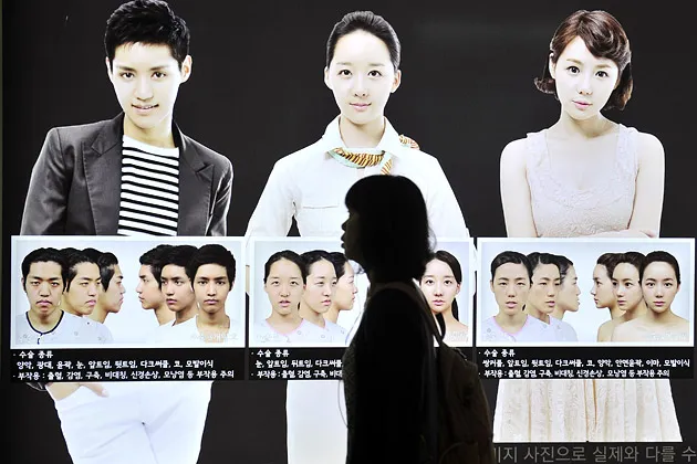A billboard in a Seoul subway station advertises jaw surgery
